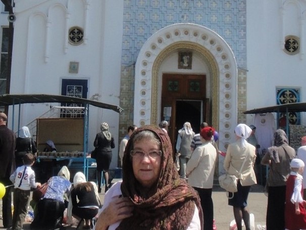 Joan outside church